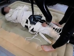 Hinako House of Bondage – Taped Down to the Bed in a Latex